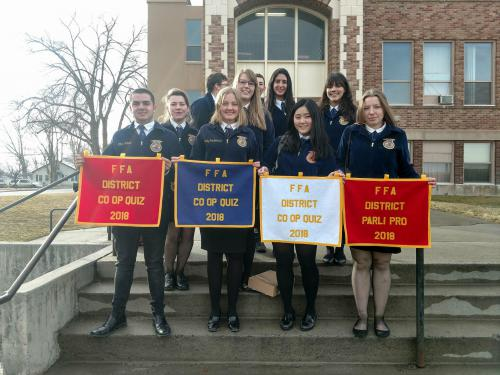 students holding FFA flags